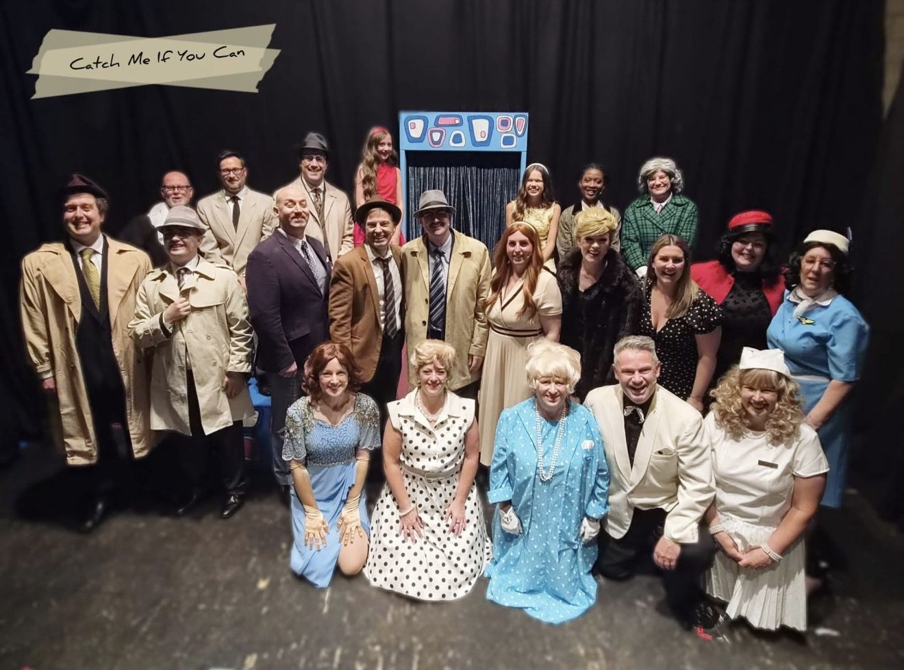 The full Catch Me If You Can company, more than twenty performers in 1960s costume, gathered on stage